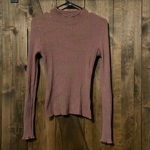 Mauve turtle neck.